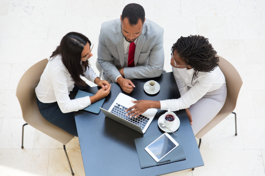 Business team working on laptop